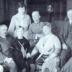 10.	Penfield Seiberling with his parents and siblings inside Stan Hywet Hall, circa late 1917. He and his siblings were the future donors of Stan Hywet; Fred’s three children would serve as donors of his share. Seated, L-R: Virginia, F.A., Franklin, Gertrude, Willard, Irene. Standing, L-R: J. Penfield, Henrietta (Fred’s wife). Source: Chapman Family.